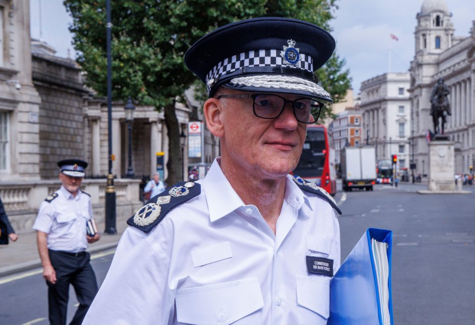 Under pressure Met Police Commissioner Sir Mark Rowley leaves the Cobra meeting on Whitehall