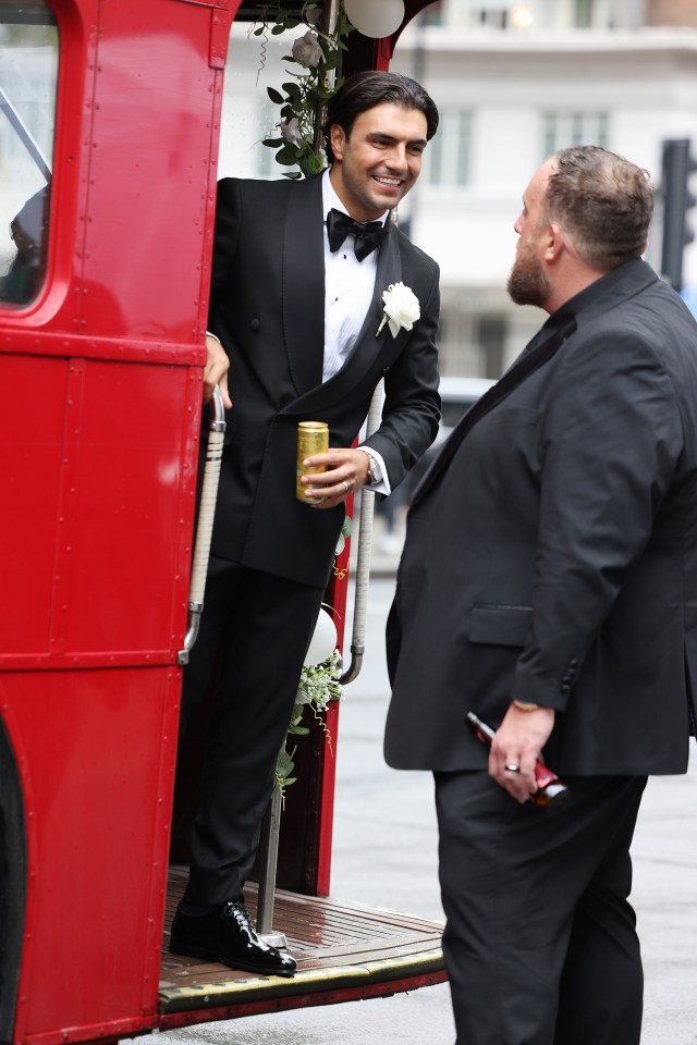 Ercan looked smart in a traditional black suit