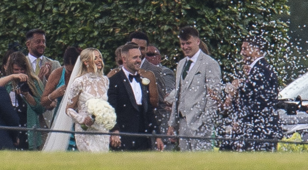 Guests showered the happy couple in confetti