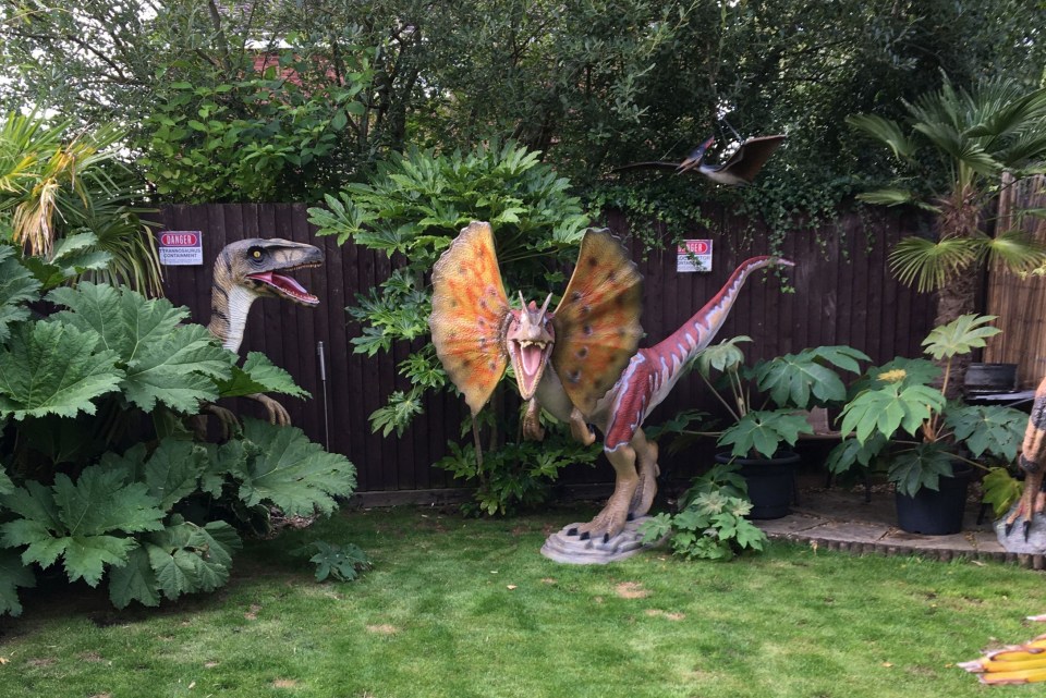 Garden centre assistant Mark Kitchen got two palm trees before persuading reluctant Helen to add a £1,000 model velociraptor