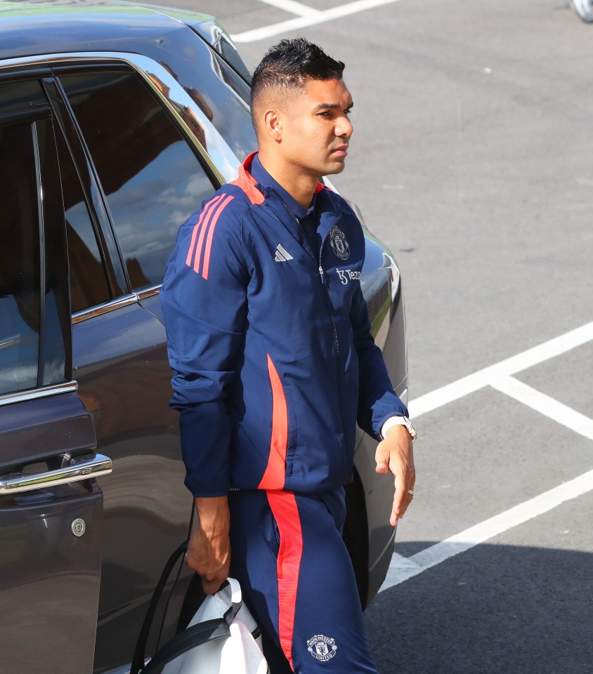 a man wearing a jacket with the word adidas on it