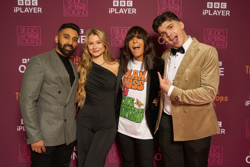 a group of people posing for a picture in front of a wall that says bbc iplayer