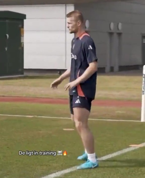 a man is standing on a soccer field with the caption deligt in training