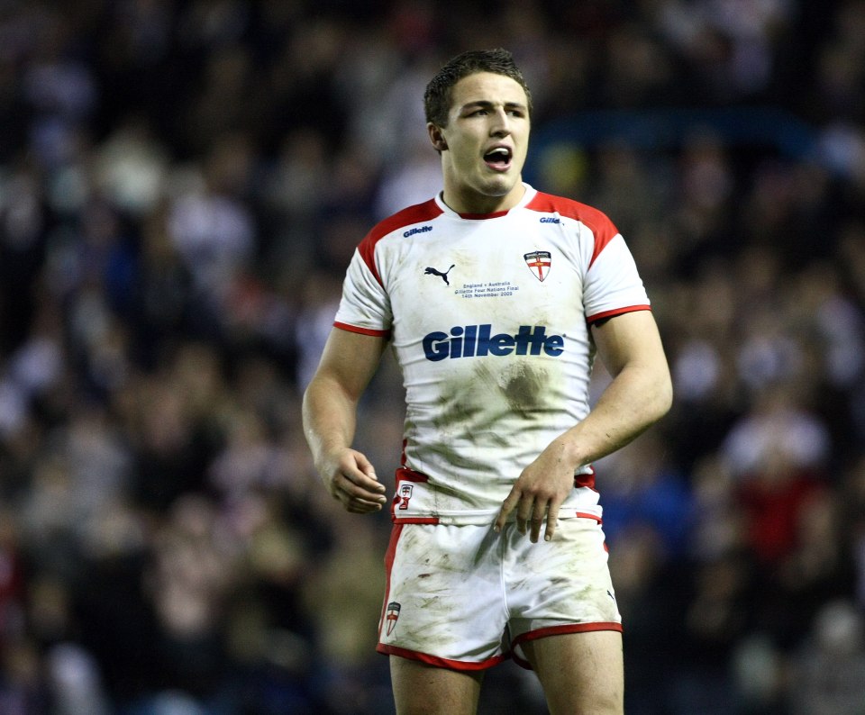 a man wearing a white and red gillette jersey