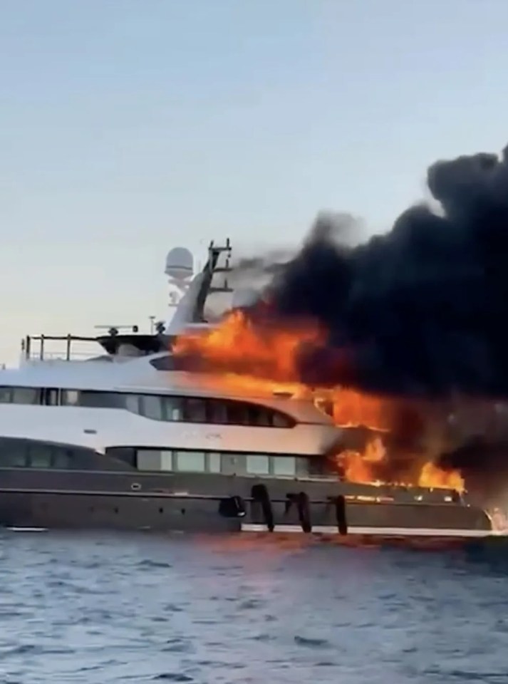 A luxurious superyacht worth £14 sunk after it caught on fire off the coast of Italy