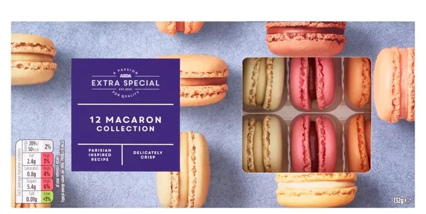 a box of macarons with a blue label that says extra special