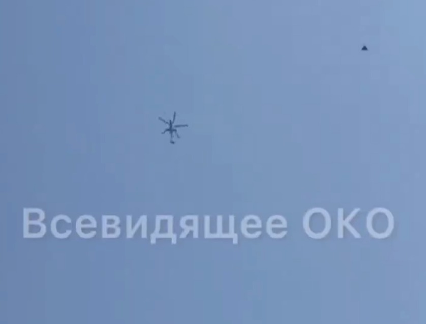 a plane is flying in the sky above the words всевидящее око