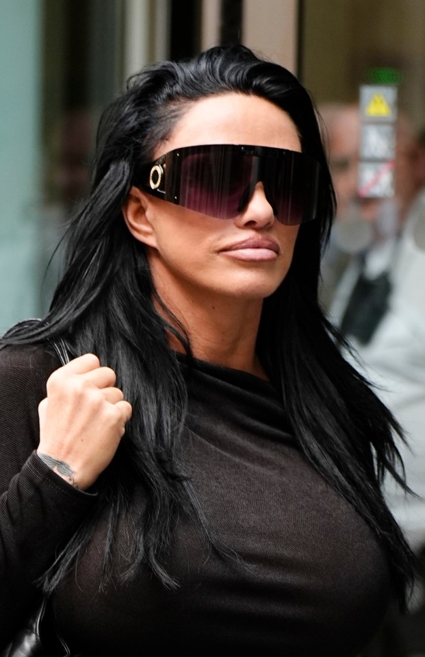 a woman wearing sunglasses with the letter o on it