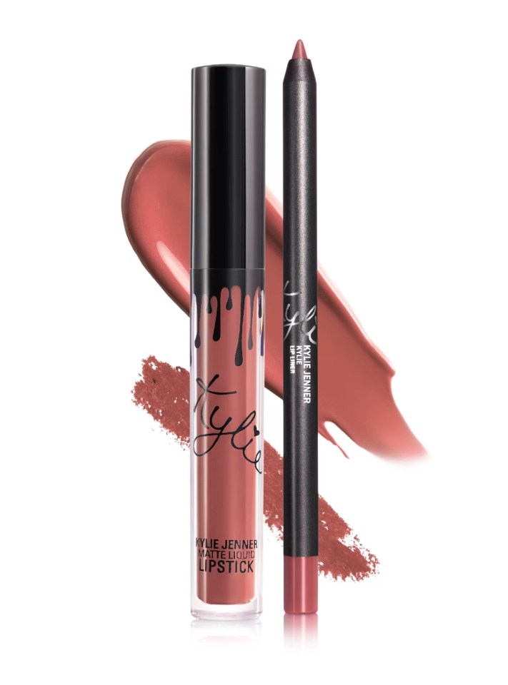 a bottle of kylie jenner liquid lipstick next to a pencil