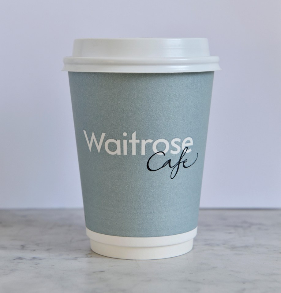 a cup that says waitrose cafe on it