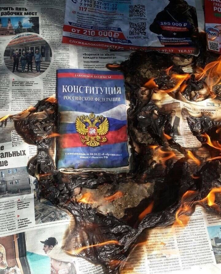 Propaganda leaflets and state newspapers from Russia are set alight