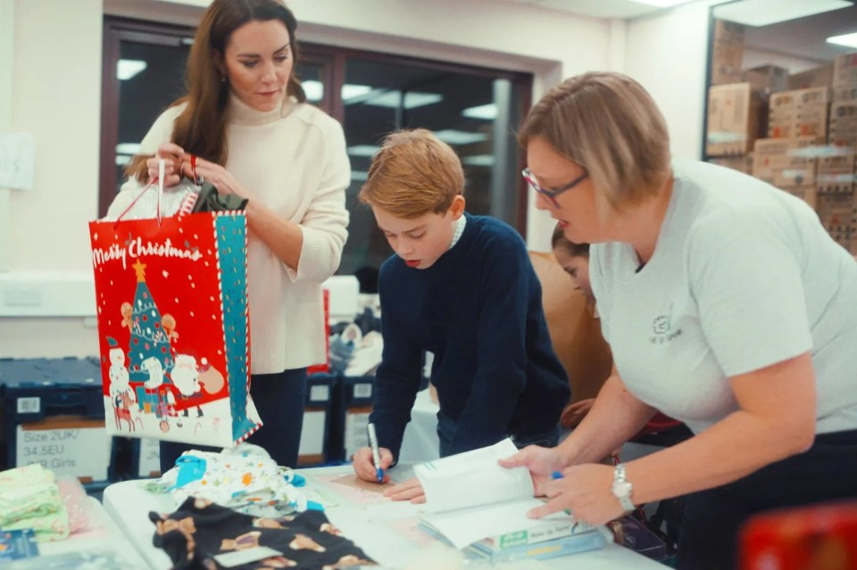 Kate took her children to volunteer at a baby bank in 2023