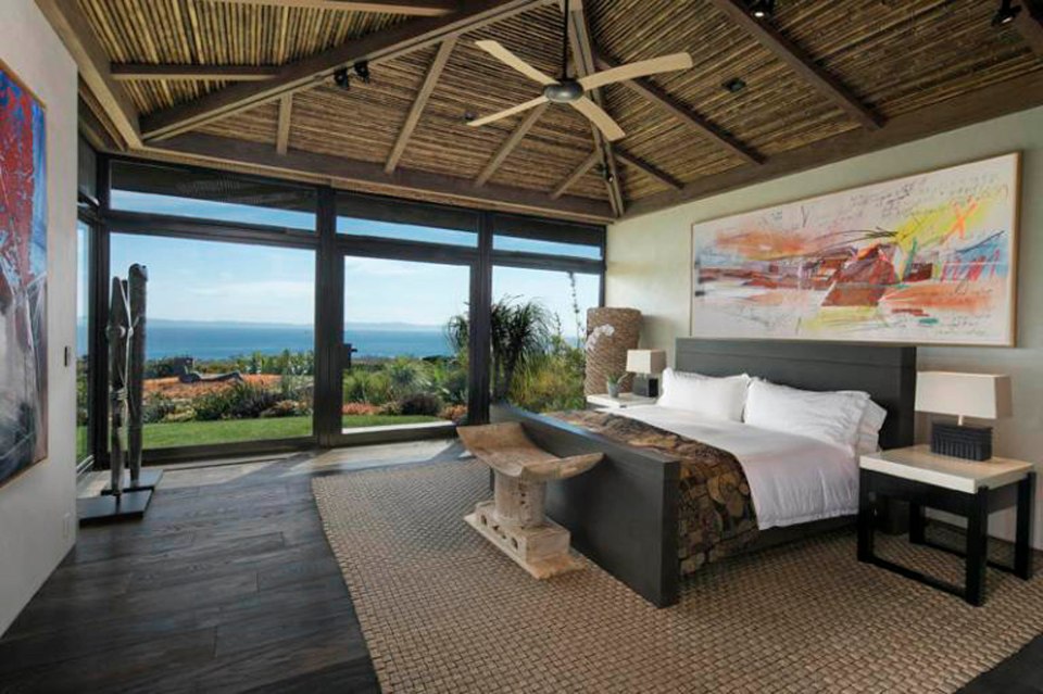 The bedroom of their former Balinese style home had an ocean view