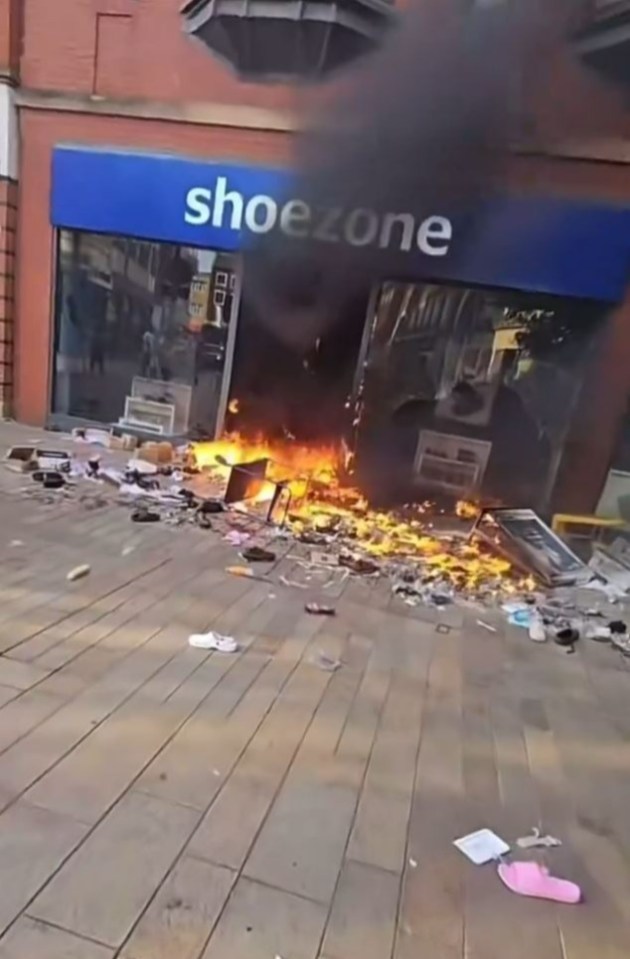 A Shoezone in Hull was set ablaze by yobs as opportunists headed inside to loot cut-price footwear