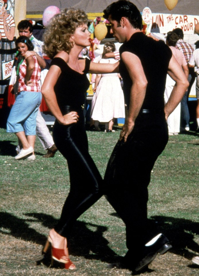 Sandy from Grease transformed from schoolgirl to vamp in those skin-tight trousers and red-heeled mules