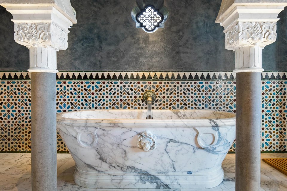 Palace style property has a marble bath tub