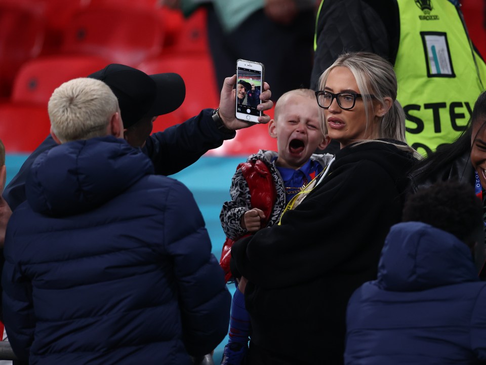 22.06.2021 EURO 2020 Czech Republic v England Group D Picture By Richard Pelham /EURO 2020 Newspapers Pool Phil Foden of England and baby and partner Rebecca Cooke