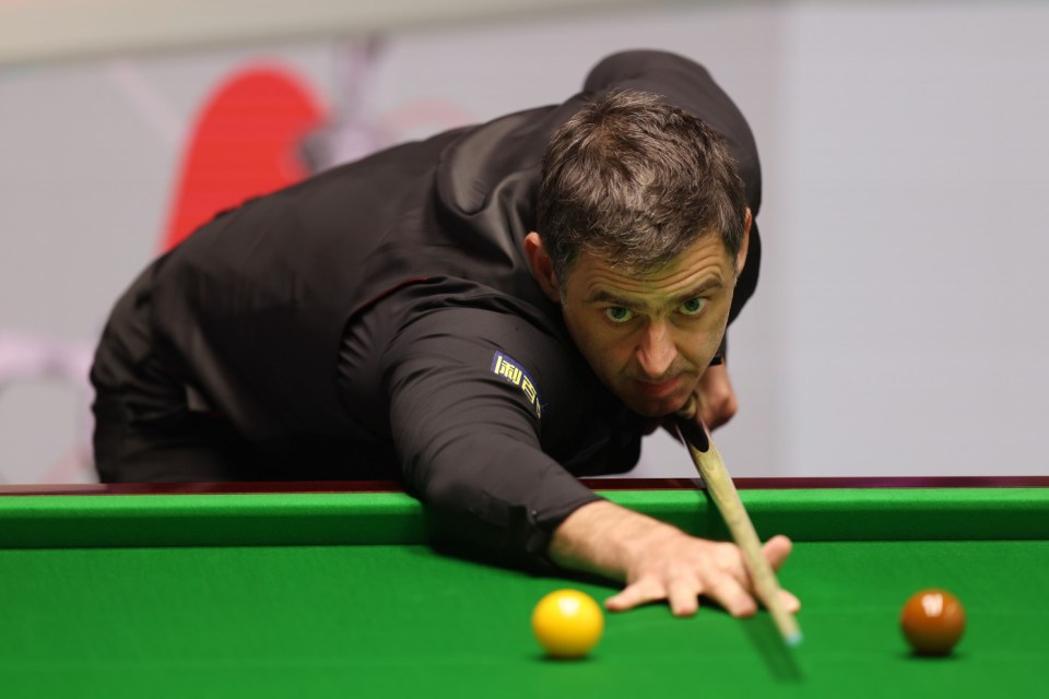 SHEFFIELD, ENGLAND - APRIL 28: Ronnie O'Sullivan of England plays a shot against Ryan Day of Wales in their round two match during day nine of the Cazoo World Snooker Championship 2024 at Crucible Theatre on April 28, 2024 in Sheffield, England. (Photo by George Wood/Getty Images)