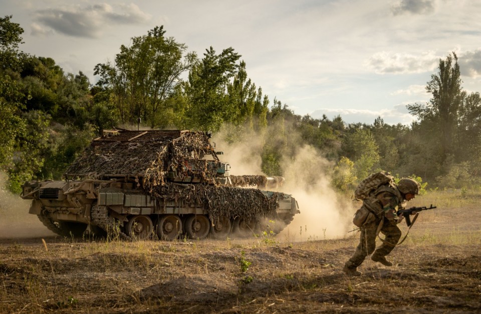 A Ukrainian tank firing in the direction of Russia