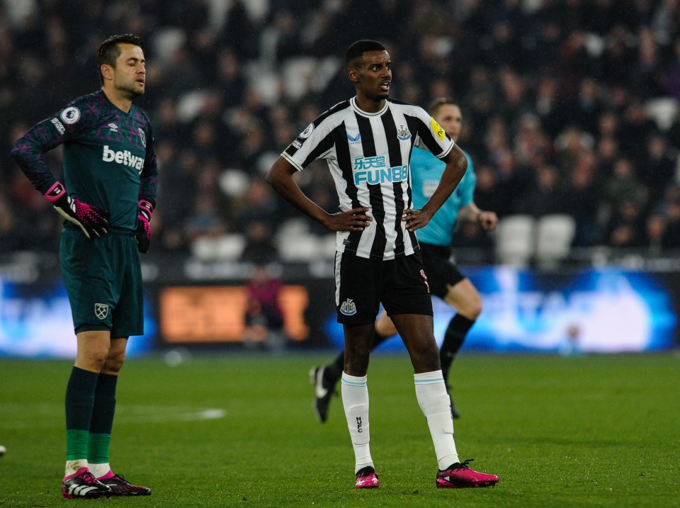 A dejected Lukasz Fabianski looks on as he's defeated by Alexander Isak's goal