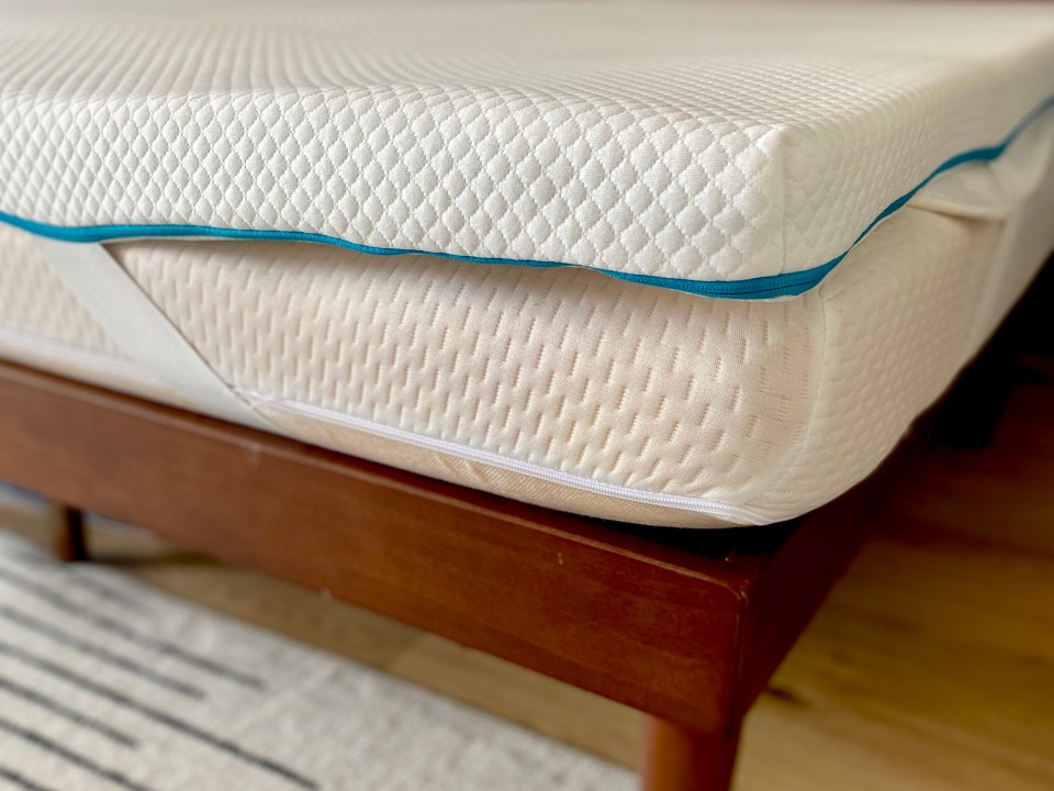 The Simba Hybrid Essential Topper stays in place with four elastic straps for each corner of your mattress