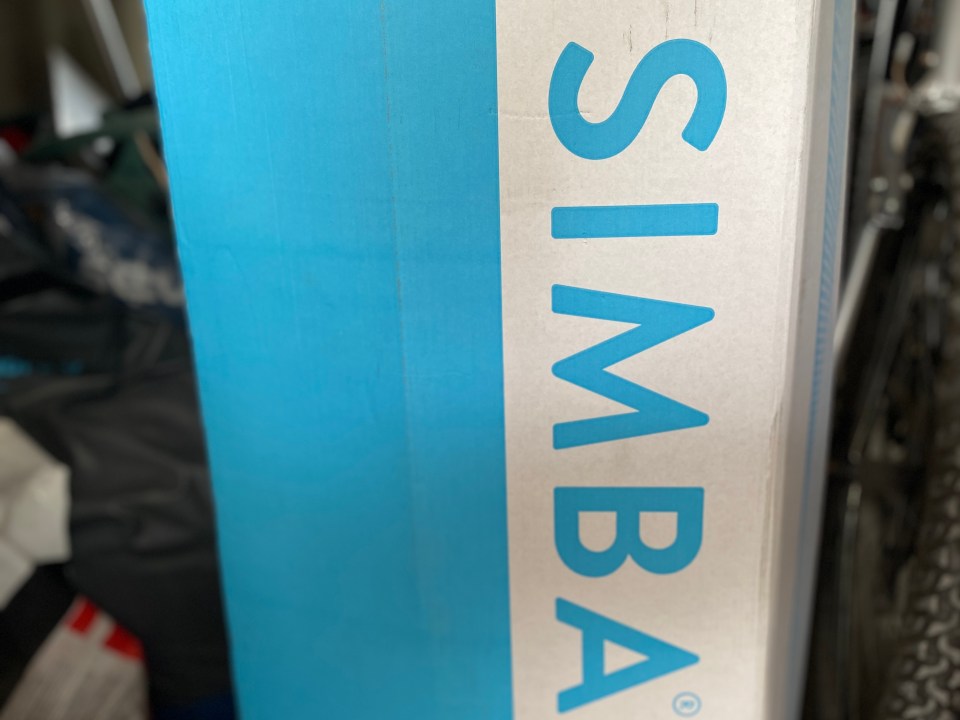 The Simba Hybrid Essential Topper arrives rolled up in a box