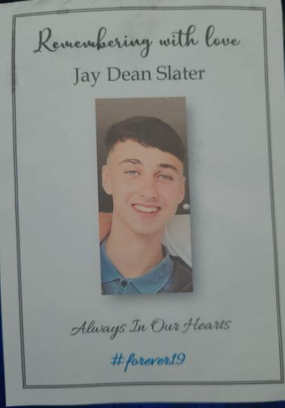 a memorial card for a young man named jay dean slater .