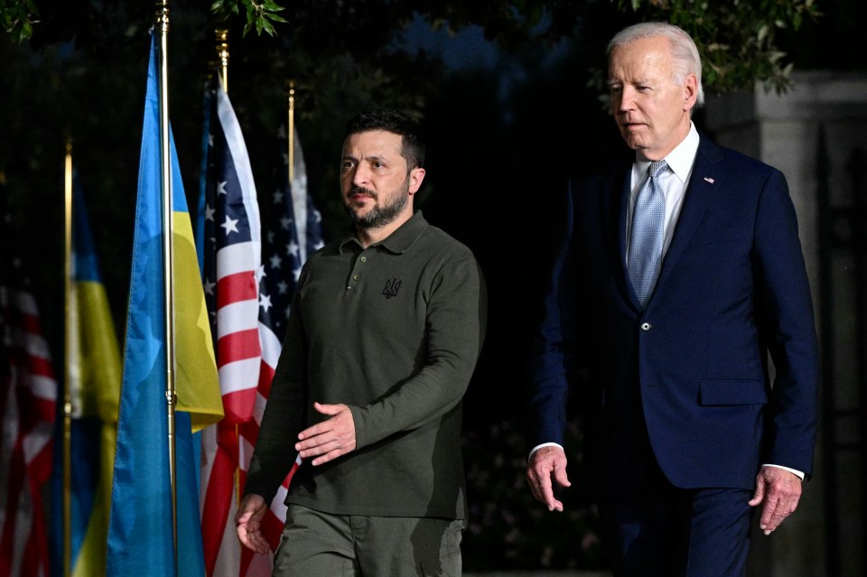 US President Joe Biden and Ukrainian President Volodymyr Zelensky arrive to sign a bilateral security agreement at the Masseria San Domenico on the sidelines of the G7 Summit hosted by Italy in Apulia region, on June 13, 2024 in Savelletri. Presidents Joe Biden and Volodymyr Zelensky signed a landmark US-Ukraine security deal on Thursday, as the US leader warned Russia's Vladimir Putin they were "not backing down". (Photo by Mandel NGAN / AFP) (Photo by MANDEL NGAN/AFP via Getty Images)