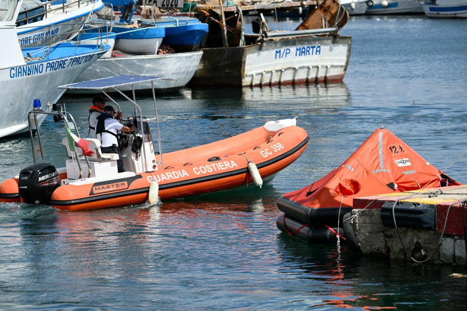 A life boat is docked in Porticello near Palermo, on August 20, 2024 a day after the British-flagged luxury yacht Bayesian sank. Specialist divers launched a fresh search for six people, including UK tech tycoon Mike Lynch and the chairman of Morgan Stanley International, missing since their yacht capsized off the Italian island of Sicily. The Bayesian, which had 22 people aboard including 10 crew, was anchored some 700 metres from port before dawn when it was struck by a waterspout, a sort of mini tornado. Fifteen people aboard, including a mother with a one-year-old baby, were plucked to safety; one man has been found dead; and six people remain missing. (Photo by Alberto PIZZOLI / AFP) (Photo by ALBERTO PIZZOLI/AFP via Getty Images)