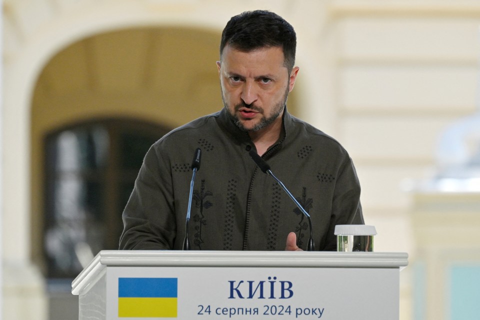 Ukraine's President Volodymyr Zelensky gestures as he speaks to media during a joint press conference with the Polish President and Lithuanian Prime Minister following their meeting in Kyiv on August 24, 2024, amid the Russian invasion of Ukraine. (Photo by SERGEI CHUZAVKOV / AFP) (Photo by SERGEI CHUZAVKOV/AFP via Getty Images)