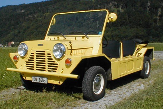 a yellow vehicle with a license plate that says om-1603