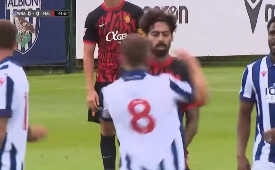 a soccer player with the number 8 on his jersey