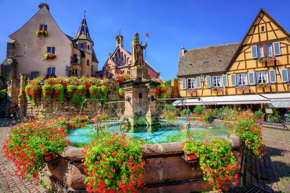 In the summer, the French village is decorated in colourful buildings