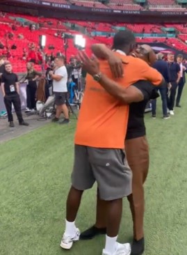 Arsenal legend Ian Wright greeted two content creators with a big hug