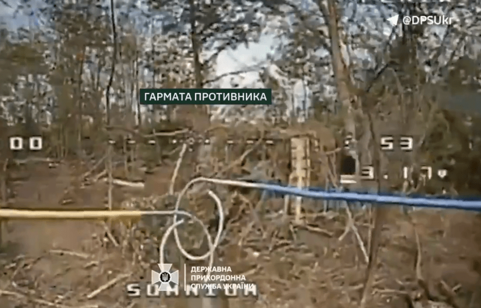 Here blue and yellow detonating wires can be seen as the drone approaches a Russian bunker