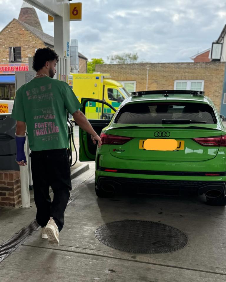 The show winner posed with his bright green Audi