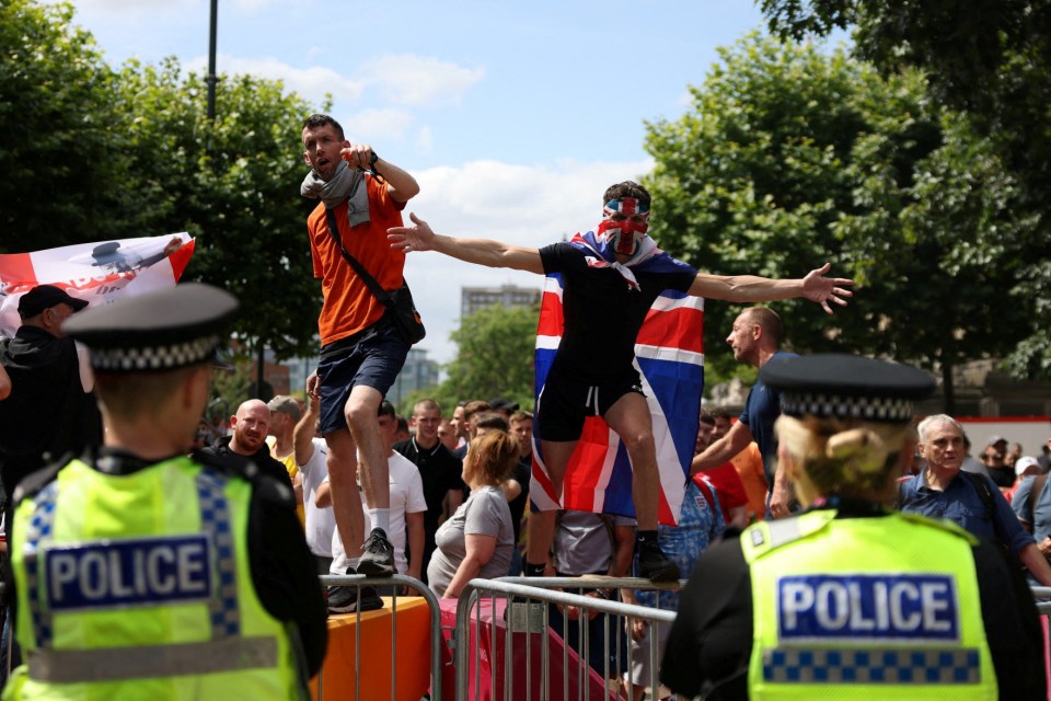 Demonstrators attend a protest against illegal immigration, in Leeds, Britain, August 3, 2024. REUTERS/Hollie Adams TPX IMAGES OF THE DAY