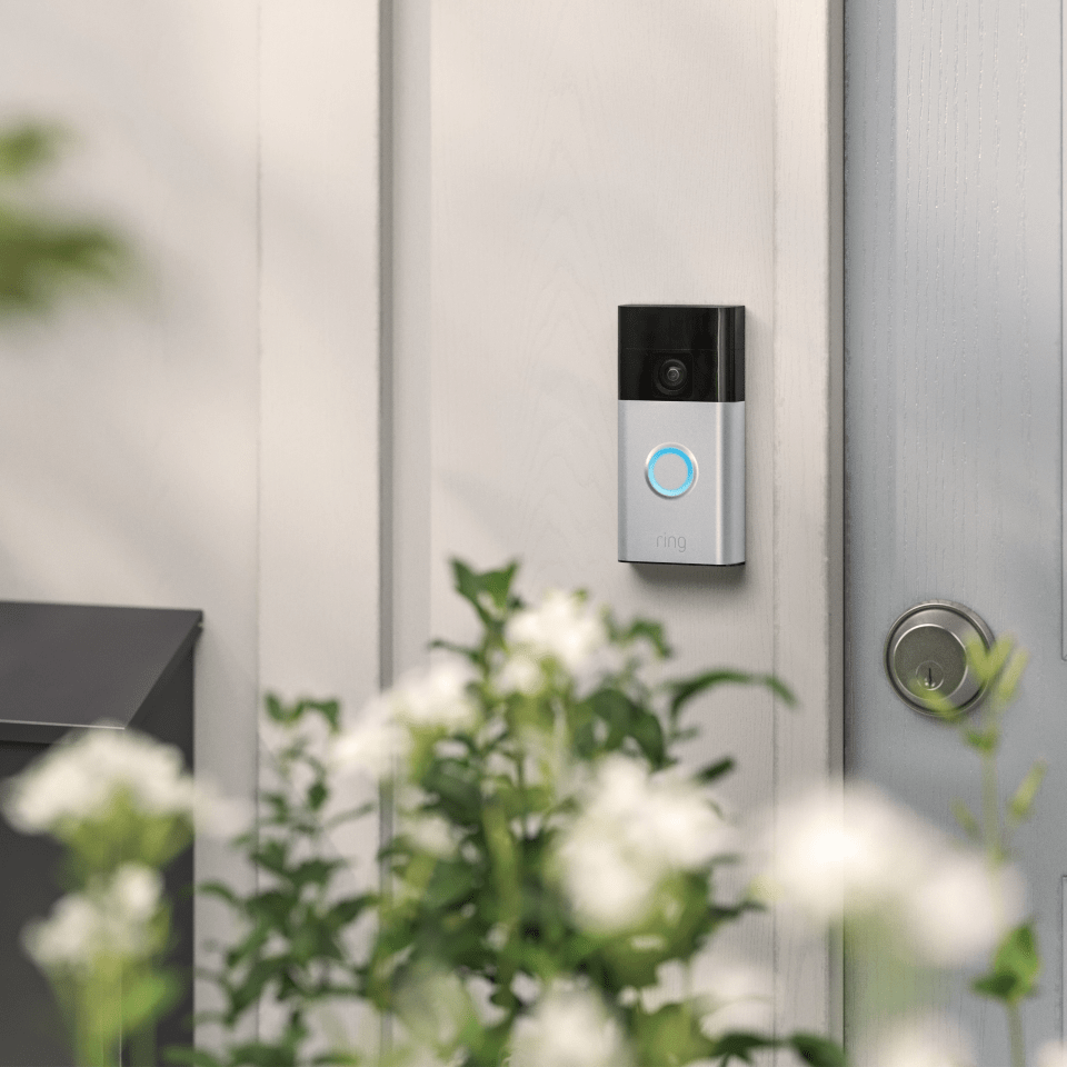 a ring doorbell is mounted on the side of a door