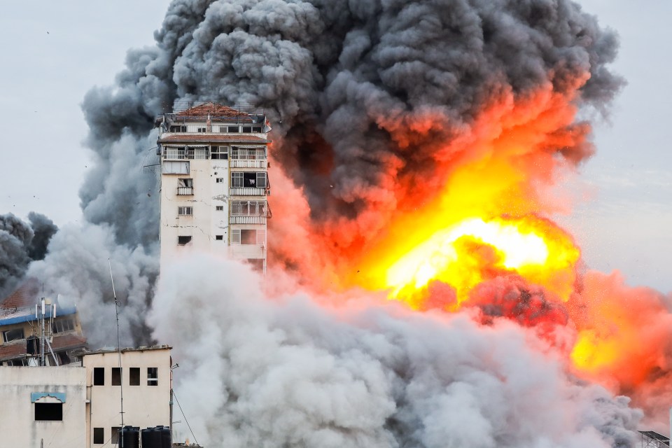 Smoke and flames billow after Israeli forces struck a high-rise tower in Gaza City, October 7, 2023. Palestinian militants have begun a "war" against Israel which they infiltrated by air, sea and land from the blockaded Gaza Strip, Israeli officials said, a major escalation in the Israeli-Palestinian conflict Pictured: GV,General View Ref: SPL9955200 071023 NON-EXCLUSIVE Picture by: Yasser 24 / SplashNews.com Splash News and Pictures USA: 310-525-5808 UK: 020 8126 1009 eamteam@shutterstock.com World Rights,