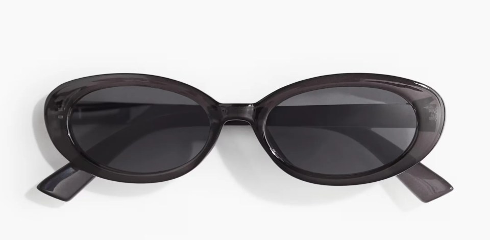 a pair of black sunglasses with a black frame and black lenses