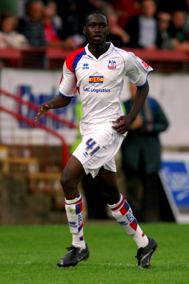 a soccer player wearing a red and white striped shirt that says starglaz