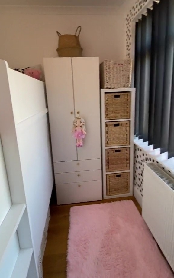 Their eldest daughter had the top bunk, and lots of storage in the way of a wardrobe and drawers