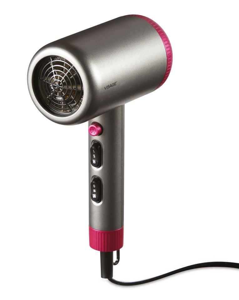 a hair dryer with a red button that says ' volume ' on it