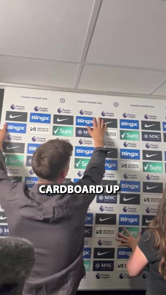 Staff were putting up the cardboard advertising boards for the post-match interviews