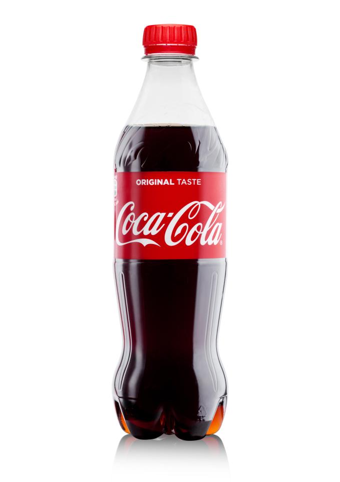 a bottle of coca cola with a red cap