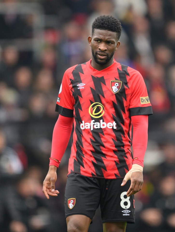 a man wearing a black msp capital jersey