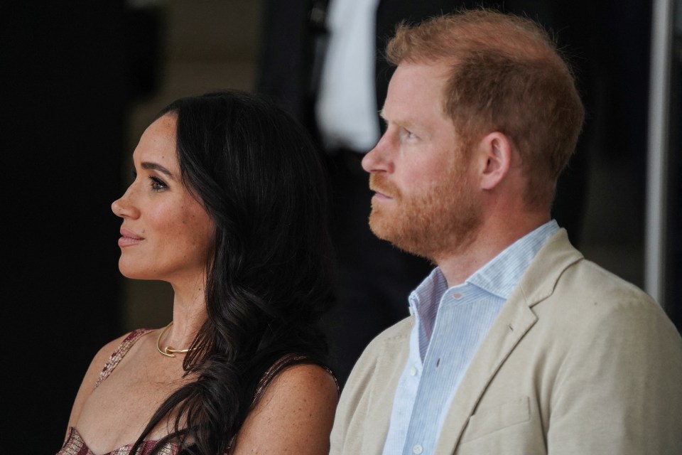 a man and a woman are standing next to each other