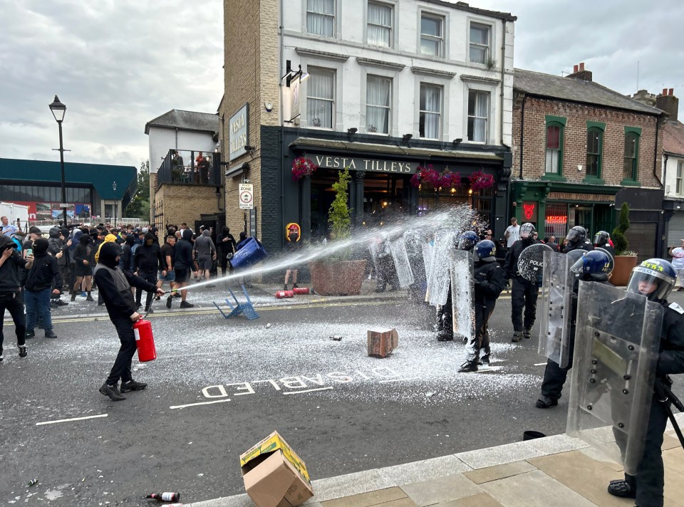 Rioters spraying fire extinguishers at police officers in Hartlepool