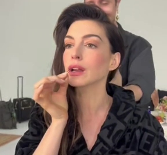 Anne Hathaway revealed the 2p hack she swears by when her pout is looking "wilted"