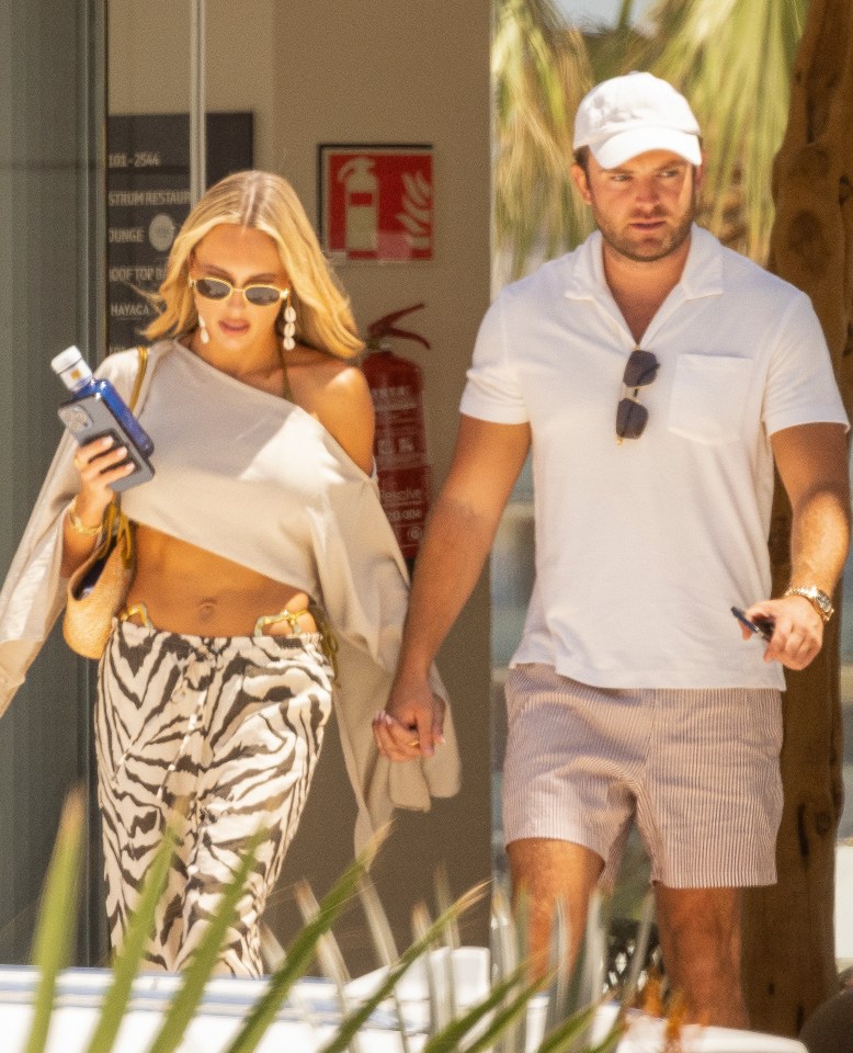 Amber was spotted with her new boyfriend Archie Chandler in Ibiza